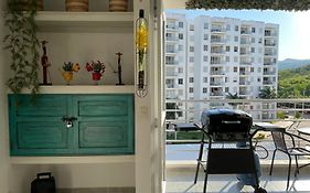 Apto nuevo en Girardot, piscina, BBQ, terraza.